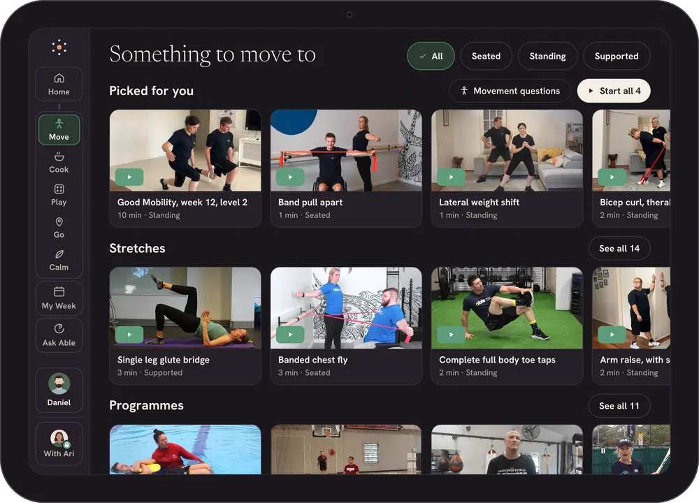 Able on iPad: the Move library. Picked for you, Stretches and Programmes, each a row of videos with real people, filtered by seated, standing and supported.