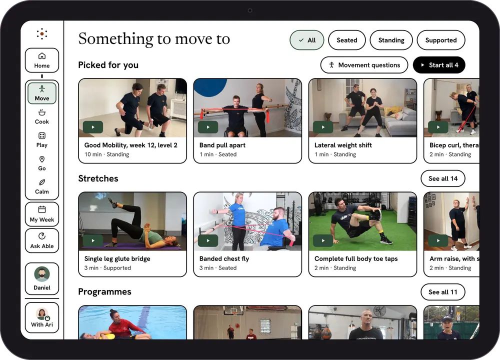 Able on iPad: the Move library. Picked for you, Stretches and Programmes, each a row of videos with real people, filtered by seated, standing and supported.