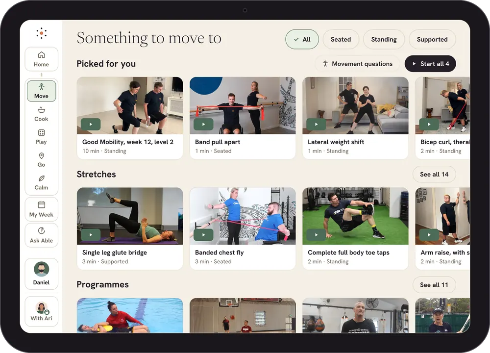 Able on iPad: the Move library. Picked for you, Stretches and Programmes, each a row of videos with real people, filtered by seated, standing and supported.